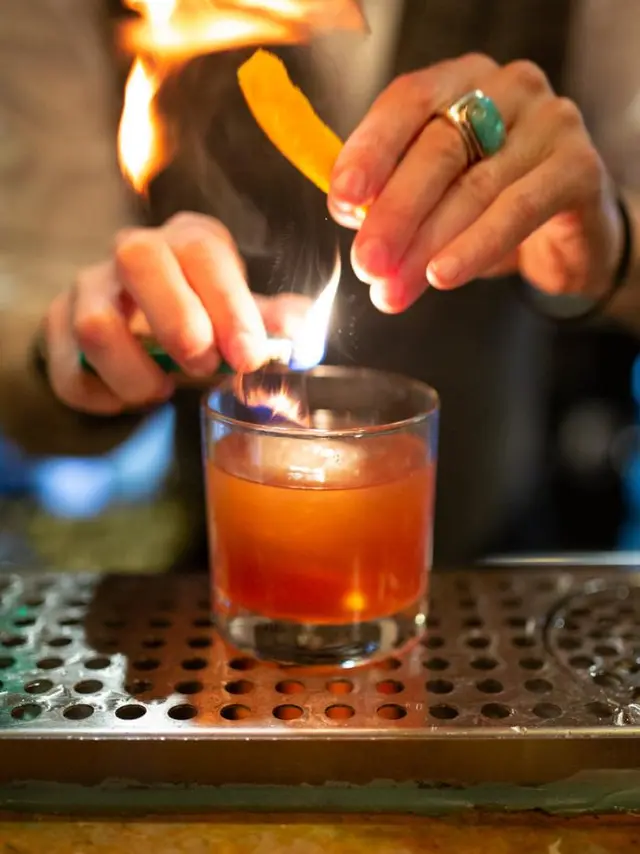 Hands making a cocktail at the Celt