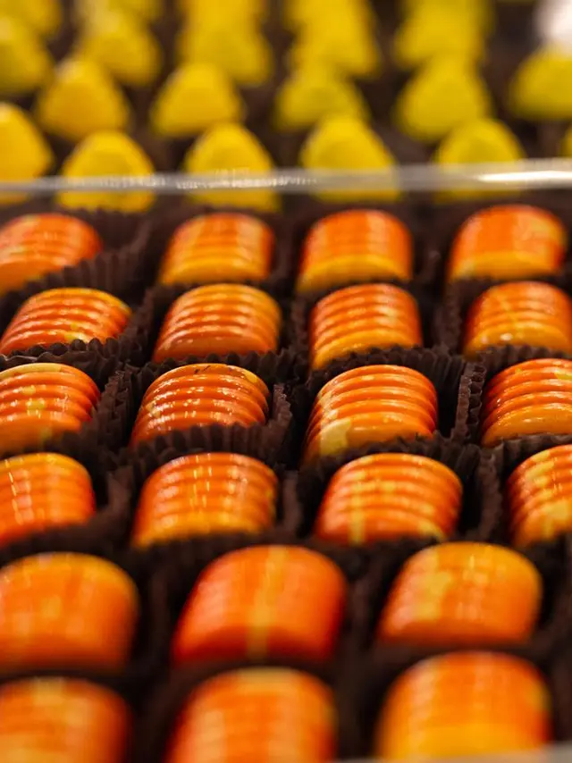 yellow and orange candy truffles