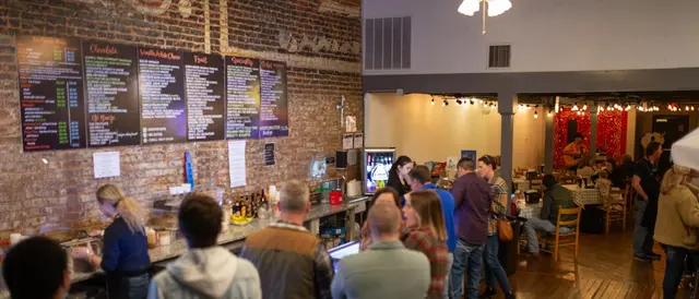 ice cream parlor with a long line at the counter