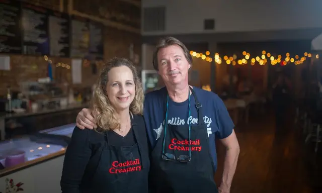 man and woman wearing Cocktail Creamery aprons