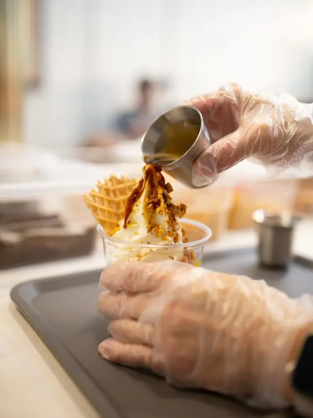 Miruku - hands pouring coffee over ice cream