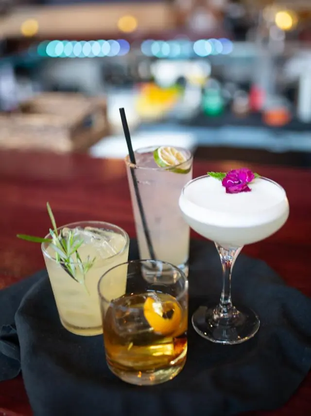 Four Urban Grill cocktails on a table