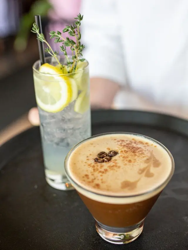 Two drinks on a serving tray